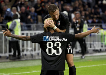 2024-10-24 - Gedson Fernandes of Besiktas celebrates his goal with Ciro Immobile of Besiktas during the UEFA Europa League, League phase, matchday 3 football match between Olympique Lyonnais (Lyon) and Besiktas JK on 24 October 2024 at Groupama stadium in Decines-Charpieu near Lyon, France - FOOTBALL - EUROPA LEAGUE - LYON V BESIKTAS - UEFA EUROPA LEAGUE - SOCCER