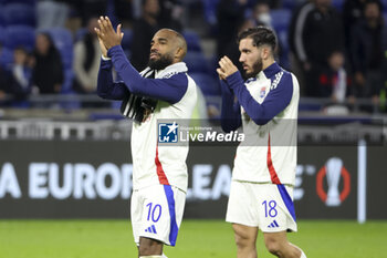 2024-10-24 - Alexandre Lacazette, Rayan Cherki of Lyon salute the supporters following the UEFA Europa League, League phase, matchday 3 football match between Olympique Lyonnais (Lyon) and Besiktas JK on 24 October 2024 at Groupama stadium in Decines-Charpieu near Lyon, France - FOOTBALL - EUROPA LEAGUE - LYON V BESIKTAS - UEFA EUROPA LEAGUE - SOCCER