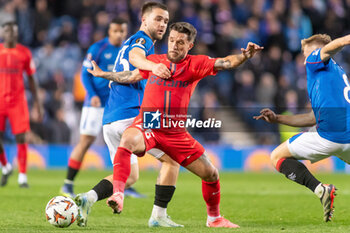 2024-10-24 - Alexandru Baluța of FC Steaua Bucharest and Nicolas Raskin of Rangers during the UEFA Europa League, League phase, Matchday 3 football match between Rangers and Steaua Bucharest on 24 October 2024 at Ibrox in Glasgow, Scotland - FOOTBALL - EUROPA LEAGUE - RANGERS V FCSB - UEFA EUROPA LEAGUE - SOCCER