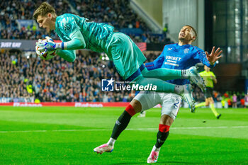 2024-10-24 - Stefan Tarnovanu of FC Steaua Bucharest and James Tavernier of Rangers during the UEFA Europa League, League phase, Matchday 3 football match between Rangers and Steaua Bucharest on 24 October 2024 at Ibrox in Glasgow, Scotland - FOOTBALL - EUROPA LEAGUE - RANGERS V FCSB - UEFA EUROPA LEAGUE - SOCCER