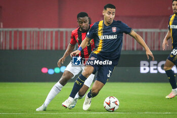 2024-11-07 - Youssoufa MOUKOKO of Nice and Anass SALAH-EDDINE of FC Twente during the UEFA Europa League, League Phase MD4 football match between OGC Nice and FC Twente on 7 November 2024 at Allianz Riviera in Nice, France - FOOTBALL - EUROPA LEAGUE - NICE V TWENTE - UEFA EUROPA LEAGUE - SOCCER