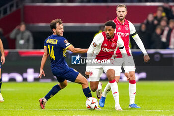 2024-11-07 - Chuba Akpom of AFC Ajax and Joris van Overeem of Maccabi Tel Aviv during the UEFA Europa League, League Phase, MD4 football match between AFC Ajax and Maccabi Tel Aviv on November 7, 2024 at Johan Cruijff ArenA in Amsterdam, Netherlands - FOOTBALL - EUROPA LEAGUE - AJAX V MACCABI TEL AVIV - UEFA EUROPA LEAGUE - SOCCER