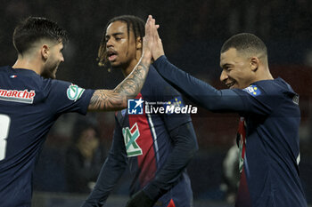 2024-02-07 - Kylian Mbappe of PSG celebrates his goal with Lucas Beraldo, Bradley Barcola (left) during the French Cup, round of 16 football match between Paris Saint-Germain (PSG) and Stade Brestois 29 (Brest) on February 7, 2024 at Parc des Princes stadium in Paris, France - FOOTBALL - FRENCH CUP - PARIS SG V BREST - FRENCH CUP - SOCCER