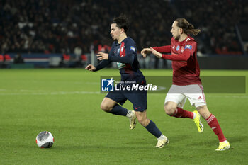 2024-02-07 - Vitinha of PSG, Adrien Lebeau of Brest during the French Cup, round of 16 football match between Paris Saint-Germain (PSG) and Stade Brestois 29 (Brest) on February 7, 2024 at Parc des Princes stadium in Paris, France - FOOTBALL - FRENCH CUP - PARIS SG V BREST - FRENCH CUP - SOCCER