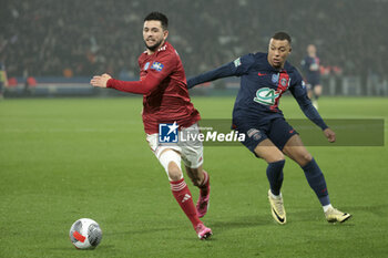 2024-02-07 - Julien Le Cardinal of Brest, Kylian Mbappe of PSG during the French Cup, round of 16 football match between Paris Saint-Germain (PSG) and Stade Brestois 29 (Brest) on February 7, 2024 at Parc des Princes stadium in Paris, France - FOOTBALL - FRENCH CUP - PARIS SG V BREST - FRENCH CUP - SOCCER