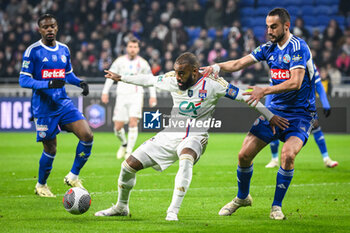 2024-02-27 - Alexandre LACAZETTE of Lyon and Lucas PERRIN of Strasbourg during the French Cup, Quarter-Finals football match between Olympique Lyonnais (Lyon) and RC Strasbourg on February 27, 2024 at Groupama stadium in Decines-Charpieu near Lyon, France - FOOTBALL - FRENCH CUP - LYON V STRASBOURG - FRENCH CUP - SOCCER