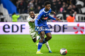 2024-02-27 - Ernest NUAMAH of Lyon and Saidou SOW of Strasbourg during the French Cup, Quarter-Finals football match between Olympique Lyonnais (Lyon) and RC Strasbourg on February 27, 2024 at Groupama stadium in Decines-Charpieu near Lyon, France - FOOTBALL - FRENCH CUP - LYON V STRASBOURG - FRENCH CUP - SOCCER