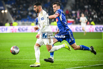 2024-02-27 - Said BENRAHMA of Lyon and Frederic GUILBERT of Strasbourg during the French Cup, Quarter-Finals football match between Olympique Lyonnais (Lyon) and RC Strasbourg on February 27, 2024 at Groupama stadium in Decines-Charpieu near Lyon, France - FOOTBALL - FRENCH CUP - LYON V STRASBOURG - FRENCH CUP - SOCCER