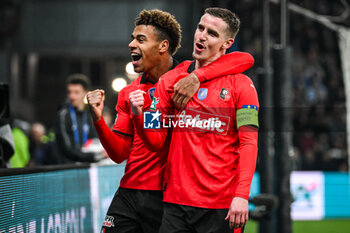 2024-02-29 - Benjamin BOURIGEAUD of Rennes celebrate his goal with Desire DOUE of Rennes during the French Cup, Quarter-Finals football match between Le Puy Foot 43 Auvergne and Stade Rennais (Rennes) on February 29, 2024 at Geoffroy Guichard stadium in Saint-Étienne, France - FOOTBALL - FRENCH CUP - LE PUY V RENNES - FRENCH CUP - SOCCER