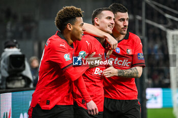2024-02-29 - Benjamin BOURIGEAUD of Rennes celebrate his goal with Desire DOUE of Rennes and Baptiste SANTAMARIA of Rennes during the French Cup, Quarter-Finals football match between Le Puy Foot 43 Auvergne and Stade Rennais (Rennes) on February 29, 2024 at Geoffroy Guichard stadium in Saint-Étienne, France - FOOTBALL - FRENCH CUP - LE PUY V RENNES - FRENCH CUP - SOCCER