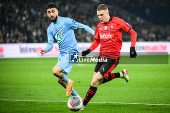 2024-02-29 - Salim AKKAL of Le Puy and Adrien TRUFFERT of Rennes during the French Cup, Quarter-Finals football match between Le Puy Foot 43 Auvergne and Stade Rennais (Rennes) on February 29, 2024 at Geoffroy Guichard stadium in Saint-Etienne, France - FOOTBALL - FRENCH CUP - LE PUY V RENNES - FRENCH CUP - SOCCER