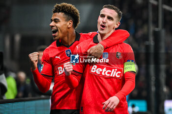 2024-02-29 - Benjamin BOURIGEAUD of Rennes celebrate his goal with Desire DOUE of Rennes during the French Cup, Quarter-Finals football match between Le Puy Foot 43 Auvergne and Stade Rennais (Rennes) on February 29, 2024 at Geoffroy Guichard stadium in Saint-Etienne, France - FOOTBALL - FRENCH CUP - LE PUY V RENNES - FRENCH CUP - SOCCER