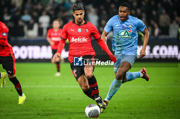 2024-02-29 - Ludovic BLAS of Rennes and Jesah MABEPA AYESSA ONDZE of Le Puy during the French Cup, Quarter-Finals football match between Le Puy Foot 43 Auvergne and Stade Rennais (Rennes) on February 29, 2024 at Geoffroy Guichard stadium in Saint-Etienne, France - FOOTBALL - FRENCH CUP - LE PUY V RENNES - FRENCH CUP - SOCCER