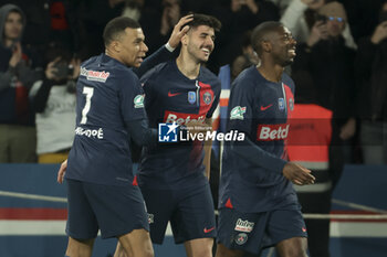 2024-03-13 - Lucas Beraldo of PSG celebrates his goal between Kylian Mbappe and Ousmane Dembele of PSG during the French Cup, Quarter-final football match between Paris Saint-Germain (PSG) and OGC Nice (OGCN) on March 13, 2024 at Parc des Princes stadium in Paris, France - FOOTBALL - FRENCH CUP - PARIS SG V NICE - FRENCH CUP - SOCCER