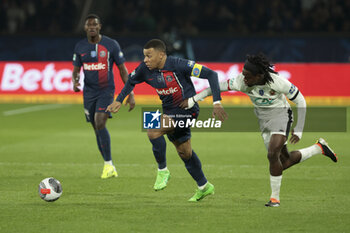 2024-03-13 - Kylian Mbappe of PSG, Jordan Lotomba of Nice during the French Cup, Quarter-final football match between Paris Saint-Germain (PSG) and OGC Nice (OGCN) on March 13, 2024 at Parc des Princes stadium in Paris, France - FOOTBALL - FRENCH CUP - PARIS SG V NICE - FRENCH CUP - SOCCER