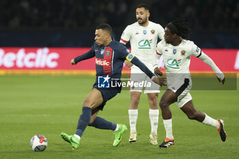 2024-03-13 - Kylian Mbappe of PSG, Jordan Lotomba of Nice during the French Cup, Quarter-final football match between Paris Saint-Germain (PSG) and OGC Nice (OGCN) on March 13, 2024 at Parc des Princes stadium in Paris, France - FOOTBALL - FRENCH CUP - PARIS SG V NICE - FRENCH CUP - SOCCER