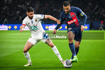 2024-03-13 - Morgan SANSON of Nice and Kylian MBAPPE of PSG during the French Cup, Quarter-final football match between Paris Saint-Germain and OGC Nice on March 13, 2024 at Parc des Princes stadium in Paris, France - FOOTBALL - FRENCH CUP - PARIS SG V NICE - FRENCH CUP - SOCCER