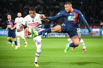2024-04-03 - Warmed OMARI of Rennes and Kylian MBAPPE of PSG during the French Cup, Semi-finals football match between Paris Saint-Germain and Stade Rennais on April 3, 2024 at Parc des Princes stadium in Paris, France - FOOTBALL - FRENCH CUP - PARIS SG V RENNES - FRENCH CUP - SOCCER