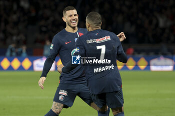 2024-04-03 - ;Kylian Mbappe of PSG celebrates his winning goal with Lucas Hernandez (left) during the French Cup, Semi-final football match between Paris Saint-Germain (PSG) and Stade Rennais (Rennes) on April 3, 2024 at Parc des Princes stadium in Paris, France - FOOTBALL - FRENCH CUP - PARIS SG V RENNES - FRENCH CUP - SOCCER