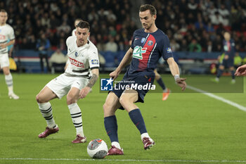 2024-04-03 - Fabian Ruiz Pena of PSG, left Baptiste Santamaria of Rennes during the French Cup, Semi-final football match between Paris Saint-Germain (PSG) and Stade Rennais (Rennes) on April 3, 2024 at Parc des Princes stadium in Paris, France - FOOTBALL - FRENCH CUP - PARIS SG V RENNES - FRENCH CUP - SOCCER