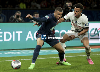 2024-04-03 - Kylian Mbappe of PSG, Guela Doue of Rennes during the French Cup, Semi-final football match between Paris Saint-Germain (PSG) and Stade Rennais (Rennes) on April 3, 2024 at Parc des Princes stadium in Paris, France - FOOTBALL - FRENCH CUP - PARIS SG V RENNES - FRENCH CUP - SOCCER