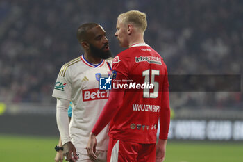 2024-04-02 - Alexandre LACAZETTE of Lyon and Lucas WOUDENBERG of Valenciennes during the French Cup, Semi-final football match between Olympique Lyonnais and Valenciennes FC on April 2, 2024 at Groupama stadium in Decines-Charpieu near Lyon, France - FOOTBALL - FRENCH CUP - LYON V VALENCIENNES - FRENCH CUP - SOCCER