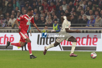 2024-04-02 - Orel MANGALA of Lyon and Makabi LILEPO of Valenciennes during the French Cup, Semi-final football match between Olympique Lyonnais and Valenciennes FC on April 2, 2024 at Groupama stadium in Decines-Charpieu near Lyon, France - FOOTBALL - FRENCH CUP - LYON V VALENCIENNES - FRENCH CUP - SOCCER