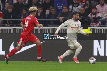 2024-04-02 - Mohamed BENRAHMA of Lyon and Allan LINGUET of Valenciennes during the French Cup, Semi-final football match between Olympique Lyonnais and Valenciennes FC on April 2, 2024 at Groupama stadium in Decines-Charpieu near Lyon, France - FOOTBALL - FRENCH CUP - LYON V VALENCIENNES - FRENCH CUP - SOCCER