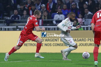 2024-04-02 - Alexandre LACAZETTE of Lyon and Julien MASSON of Valenciennes during the French Cup, Semi-final football match between Olympique Lyonnais and Valenciennes FC on April 2, 2024 at Groupama stadium in Decines-Charpieu near Lyon, France - FOOTBALL - FRENCH CUP - LYON V VALENCIENNES - FRENCH CUP - SOCCER