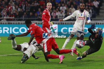 2024-04-02 - Ernest APPIAH of Lyon and Jean LOUCHET of Valenciennes and Souleymane BASSE of Valenciennes during the French Cup, Semi-final football match between Olympique Lyonnais and Valenciennes FC on April 2, 2024 at Groupama stadium in Decines-Charpieu near Lyon, France - FOOTBALL - FRENCH CUP - LYON V VALENCIENNES - FRENCH CUP - SOCCER