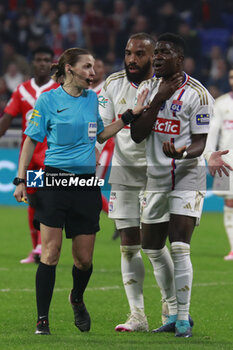 2024-04-02 - Ernest APPIAH of Lyon and Referee Stephanie FRAPPART and Alexandre LACAZETTE of Lyon during the French Cup, Semi-final football match between Olympique Lyonnais and Valenciennes FC on April 2, 2024 at Groupama stadium in Decines-Charpieu near Lyon, France - FOOTBALL - FRENCH CUP - LYON V VALENCIENNES - FRENCH CUP - SOCCER