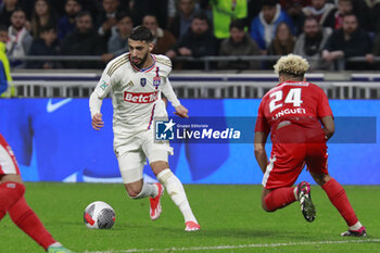 2024-04-02 - Mohamed BENRAHMA of Lyon and Allan LINGUET of Valenciennes during the French Cup, Semi-final football match between Olympique Lyonnais and Valenciennes FC on April 2, 2024 at Groupama stadium in Decines-Charpieu near Lyon, France - FOOTBALL - FRENCH CUP - LYON V VALENCIENNES - FRENCH CUP - SOCCER