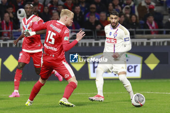2024-04-02 - Mohamed BENRAHMA of Lyon and Lucas WOUDENBERG of Valenciennes during the French Cup, Semi-final football match between Olympique Lyonnais and Valenciennes FC on April 2, 2024 at Groupama stadium in Decines-Charpieu near Lyon, France - FOOTBALL - FRENCH CUP - LYON V VALENCIENNES - FRENCH CUP - SOCCER