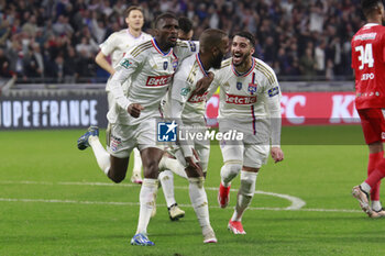 2024-04-02 - Alexandre LACAZETTE of Lyon celebrate scoring the goal and Mohamed BENRAHMA of Lyon and Clinton MATA of Lyon during the French Cup, Semi-final football match between Olympique Lyonnais and Valenciennes FC on April 2, 2024 at Groupama stadium in Decines-Charpieu near Lyon, France - FOOTBALL - FRENCH CUP - LYON V VALENCIENNES - FRENCH CUP - SOCCER
