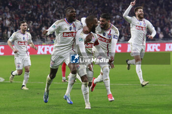 2024-04-02 - Alexandre LACAZETTE of Lyon celebrate scoring the goal and Mohamed BENRAHMA of Lyon and Clinton MATA of Lyon during the French Cup, Semi-final football match between Olympique Lyonnais and Valenciennes FC on April 2, 2024 at Groupama stadium in Decines-Charpieu near Lyon, France - FOOTBALL - FRENCH CUP - LYON V VALENCIENNES - FRENCH CUP - SOCCER