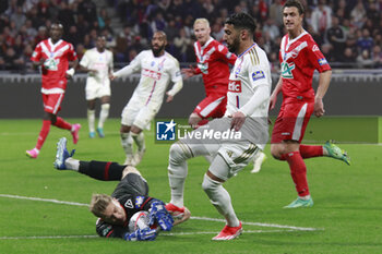 2024-04-02 - Mohamed BENRAHMA of Lyon and Jean LOUCHET of Valenciennes during the French Cup, Semi-final football match between Olympique Lyonnais and Valenciennes FC on April 2, 2024 at Groupama stadium in Decines-Charpieu near Lyon, France - FOOTBALL - FRENCH CUP - LYON V VALENCIENNES - FRENCH CUP - SOCCER