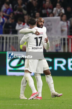 2024-04-02 - Alexandre LACAZETTE of Lyon and Mohamed BENRAHMA of Lyon during the French Cup, Semi-final football match between Olympique Lyonnais and Valenciennes FC on April 2, 2024 at Groupama stadium in Decines-Charpieu near Lyon, France - FOOTBALL - FRENCH CUP - LYON V VALENCIENNES - FRENCH CUP - SOCCER