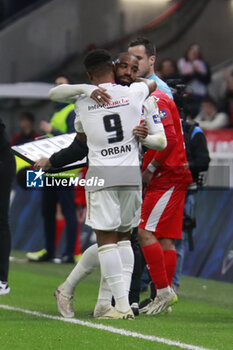 2024-04-02 - Alexandre LACAZETTE of Lyon and Gift ORBAN of Lyon during the French Cup, Semi-final football match between Olympique Lyonnais and Valenciennes FC on April 2, 2024 at Groupama stadium in Decines-Charpieu near Lyon, France - FOOTBALL - FRENCH CUP - LYON V VALENCIENNES - FRENCH CUP - SOCCER