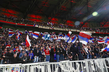 2024-04-02 - Fans of Lyon during the French Cup, Semi-final football match between Olympique Lyonnais and Valenciennes FC on April 2, 2024 at Groupama stadium in Decines-Charpieu near Lyon, France - FOOTBALL - FRENCH CUP - LYON V VALENCIENNES - FRENCH CUP - SOCCER