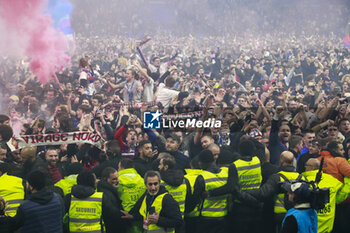 2024-04-02 - Fans of Lyon celebrate victory and qualification for the final during the French Cup, Semi-final football match between Olympique Lyonnais and Valenciennes FC on April 2, 2024 at Groupama stadium in Decines-Charpieu near Lyon, France - FOOTBALL - FRENCH CUP - LYON V VALENCIENNES - FRENCH CUP - SOCCER