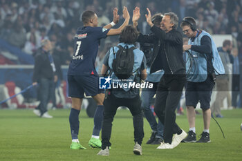 2024-05-25 - Kylian Mbappe of PSG and PSG coach Luis Enrique celebrate the victory following the French Cup Final football match between Olympique Lyonnais (OL, Lyon) and Paris Saint-Germain (PSG) on May 25, 2024 at Stade Pierre Mauroy, Decathlon Arena in Villeneuve-d'Ascq near Lille, France - FOOTBALL - FRENCH CUP - FINAL - LYON V PARIS SG - FRENCH CUP - SOCCER