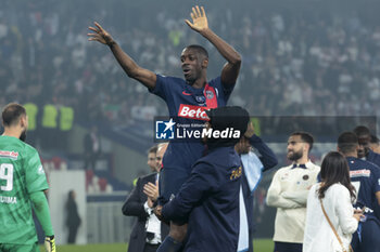 2024-05-25 - Presnel Kimpembe and Ousmane Dembele of PSG celebrate the victory following the French Cup Final football match between Olympique Lyonnais (OL, Lyon) and Paris Saint-Germain (PSG) on May 25, 2024 at Stade Pierre Mauroy, Decathlon Arena in Villeneuve-d'Ascq near Lille, France - FOOTBALL - FRENCH CUP - FINAL - LYON V PARIS SG - FRENCH CUP - SOCCER