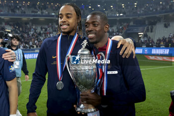 2024-05-25 - Bradley Barcola and Ousmane Dembele of PSG celebrate the victory following the French Cup Final football match between Olympique Lyonnais (OL, Lyon) and Paris Saint-Germain (PSG) on May 25, 2024 at Stade Pierre Mauroy, Decathlon Arena in Villeneuve-d'Ascq near Lille, France - FOOTBALL - FRENCH CUP - FINAL - LYON V PARIS SG - FRENCH CUP - SOCCER