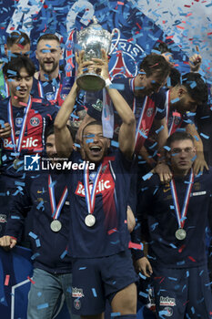 2024-05-25 - Kylian Mbappe of PSG and teammates celebrate during the podium ceremony following the French Cup Final football match between Olympique Lyonnais (OL, Lyon) and Paris Saint-Germain (PSG) on May 25, 2024 at Stade Pierre Mauroy, Decathlon Arena in Villeneuve-d'Ascq near Lille, France - FOOTBALL - FRENCH CUP - FINAL - LYON V PARIS SG - FRENCH CUP - SOCCER