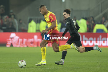 2024-01-14 - Andy Diouf of Lens, Vitinha of PSG during the French championship Ligue 1 football match between RC Lens and Paris Saint-Germain on January 14, 2024 at Stade Bollaert-Delelis in Lens, France - FOOTBALL - FRENCH CHAMP - LENS V PARIS SG - FRENCH LIGUE 1 - SOCCER
