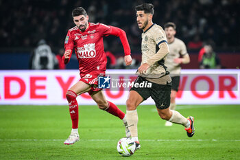 2024-01-28 - Pierre LEES-MELOU of Brest and Marco ASENSIO of PSG during the French championship Ligue 1 football match between Paris Saint-Germain and Stade Brestois (Brest) on January 28, 2024 at Parc des Princes stadium in Paris, France - FOOTBALL - FRENCH CHAMP - PARIS SG V BREST - FRENCH LIGUE 1 - SOCCER
