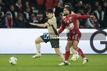 2024-01-28 - Vitinha of PSG, Mahdi Camara of Brest during the French championship Ligue 1 football match between Paris Saint-Germain and Stade Brestois (Brest) on January 28, 2024 at Parc des Princes stadium in Paris, France - FOOTBALL - FRENCH CHAMP - PARIS SG V BREST - FRENCH LIGUE 1 - SOCCER