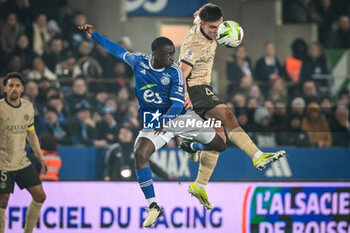 2024-02-02 - Habib DIARRA of Strasbourg and Manuel UGARTE of PSG during the French championship Ligue 1 football match between RC Strasbourg and Paris Saint-Germain on February 2, 2024 at La Meinau stadium in Strasbourg, France - FOOTBALL - FRENCH CHAMP - STRASBOURG V PARIS SG - FRENCH LIGUE 1 - SOCCER