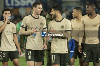 2024-02-02 - Fabian Ruiz Pena and Marco Asensio of PSG following the French championship Ligue 1 football match between RC Strasbourg and Paris Saint-Germain on February 2, 2024 at Stade de La Meinau in Strasbourg, France - FOOTBALL - FRENCH CHAMP - STRASBOURG V PARIS SG - FRENCH LIGUE 1 - SOCCER