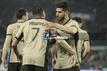 2024-02-02 - Marco Asensio of PSG celebrates his goal with Kylian Mbappe (left) during the French championship Ligue 1 football match between RC Strasbourg and Paris Saint-Germain on February 2, 2024 at Stade de La Meinau in Strasbourg, France - FOOTBALL - FRENCH CHAMP - STRASBOURG V PARIS SG - FRENCH LIGUE 1 - SOCCER